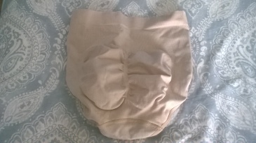 Rear view of the granny panties. The two oval shapes are where the material is is less elasticated. This gives your bum a fuller, more feminine shape.